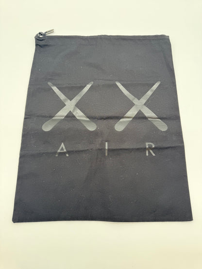 Jordan 4 Retro Kaws Grey